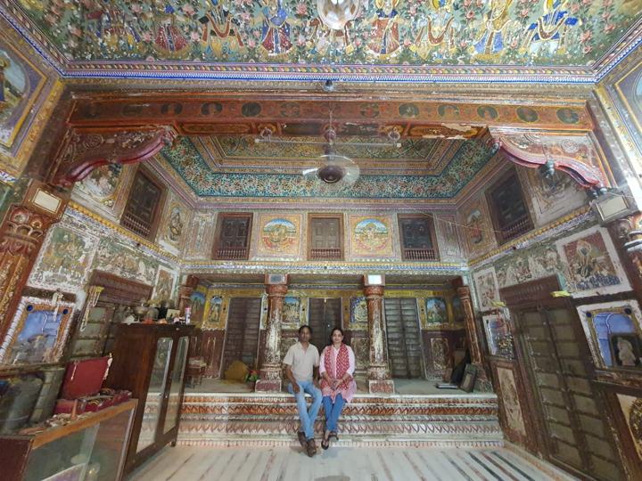 A painted haveli room with arches
