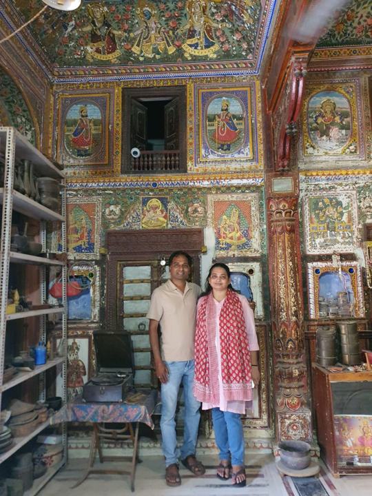 A painted room with deity panels